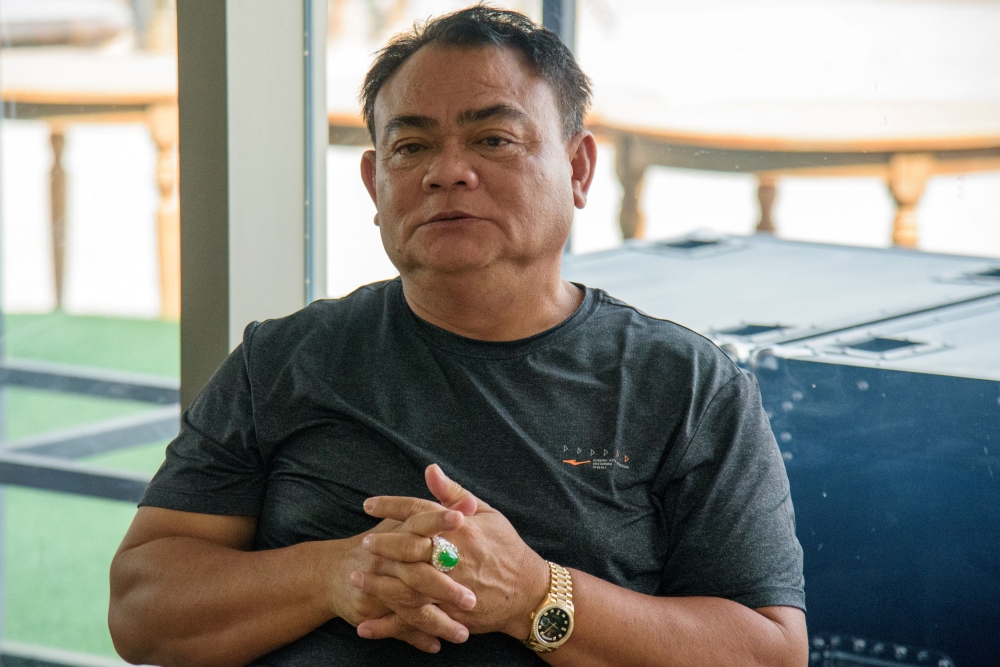 This file picture shows Myanmar warlord Saw Chit Thu pictured during an interview with local media at Shwe Kokko city, a casino, entertainment and tourism complex in Myawaddy, Myanmar February 18. — Reuters pic