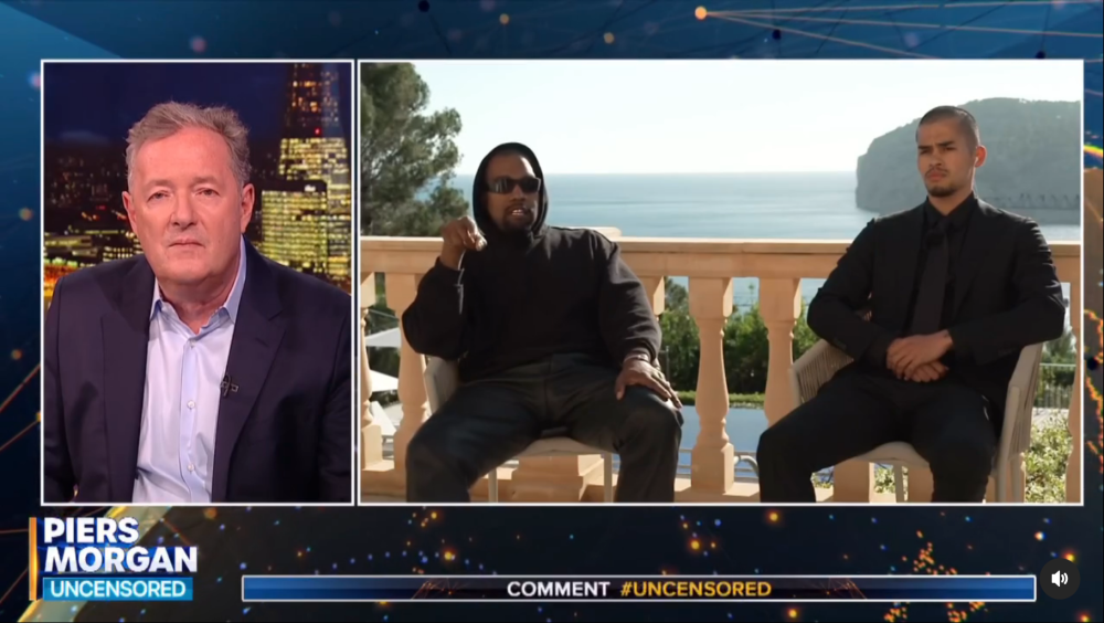 A screen capture from the interview clip shows Kanye West (centre) speaking to Piers Morgan.