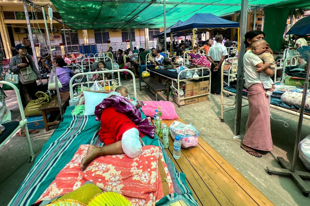 Patients lie on beds inside the compound of Sagaing Hospital following a strong earthquake near its epicenter, in Sagaing, Myanmar, April 2, 2025. — Reuters pic
