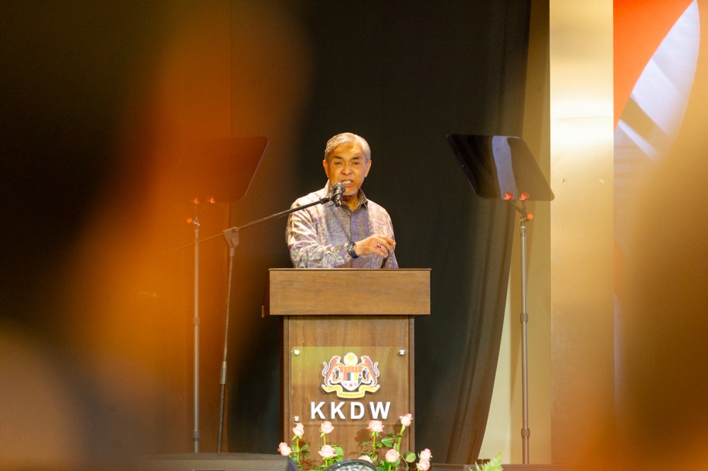 Deputy Prime Minister Datuk Seri Ahmad Zahid Hamidi delivers his keynote speech during the Rural and Regional Development Ministry’s monthly assembly in Putrajaya this morning. — Picture by Raymond Manuel