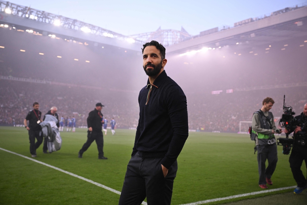 Manchester United's Portuguese head coach Ruben Amorim (centre) looks on ahead of the Uefa Europa League semi final second leg football match between Manchester United and Athletic Club Bilbao at Old Trafford stadium in Manchester May 8, 2025. — AFP pic