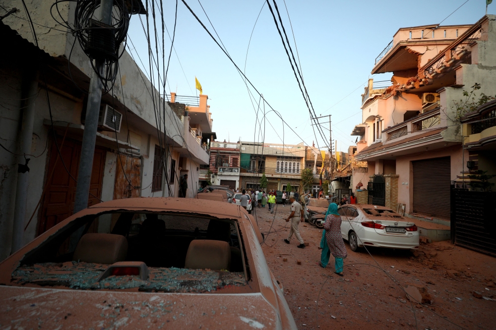 Damaged vehicles are seen in the neighbourhood, following Pakistan's military operation against India, in Rehari, Jammu, May 10, 2025. — Reuters pic 