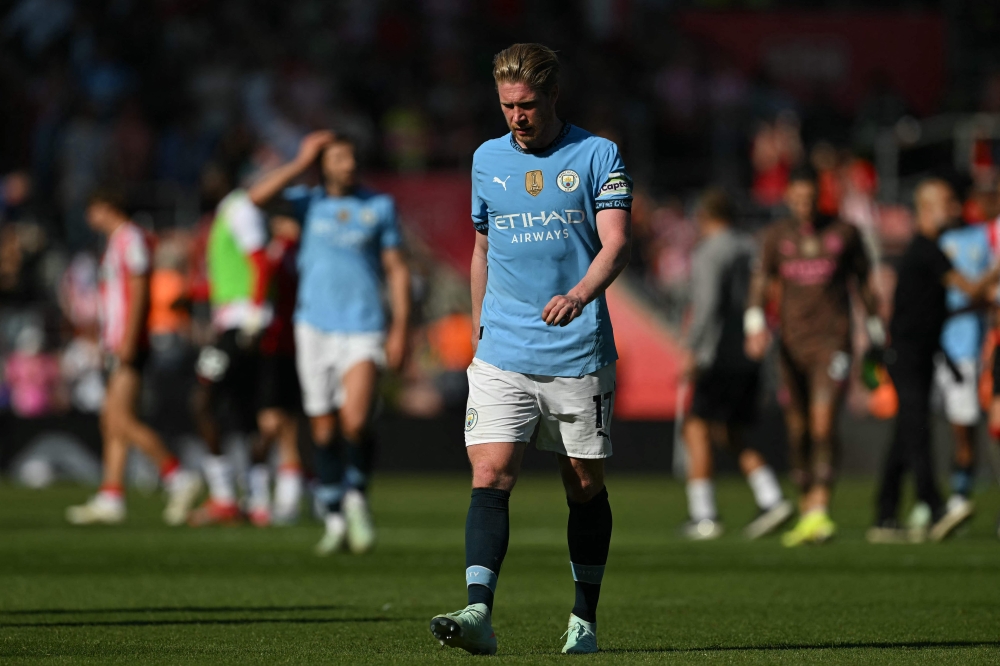 Manchester City's Belgian midfielder #17 Kevin De Bruyne walk from the pitch after the English Premier League football match between Southampton and Manchester City at St Mary's Stadium in Southampton, southern England on May 10, 2025. — AFP pic
