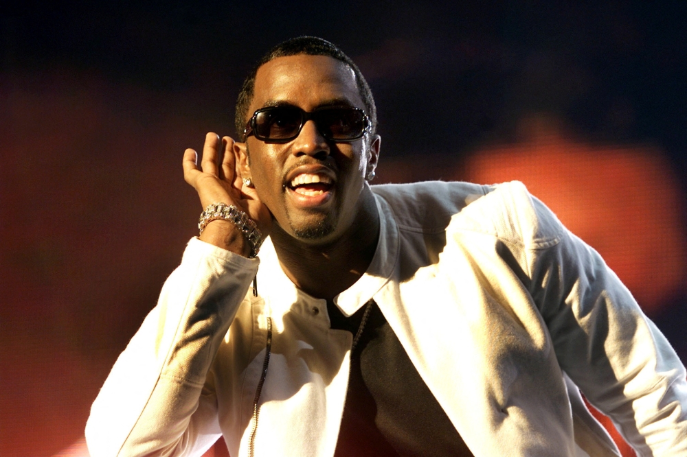 This file photo shows American rapper Sean “P Diddy” Combs performing during the MTV “Staying Alive” concert in Cape Town November 23, 2002. — Reuters pic