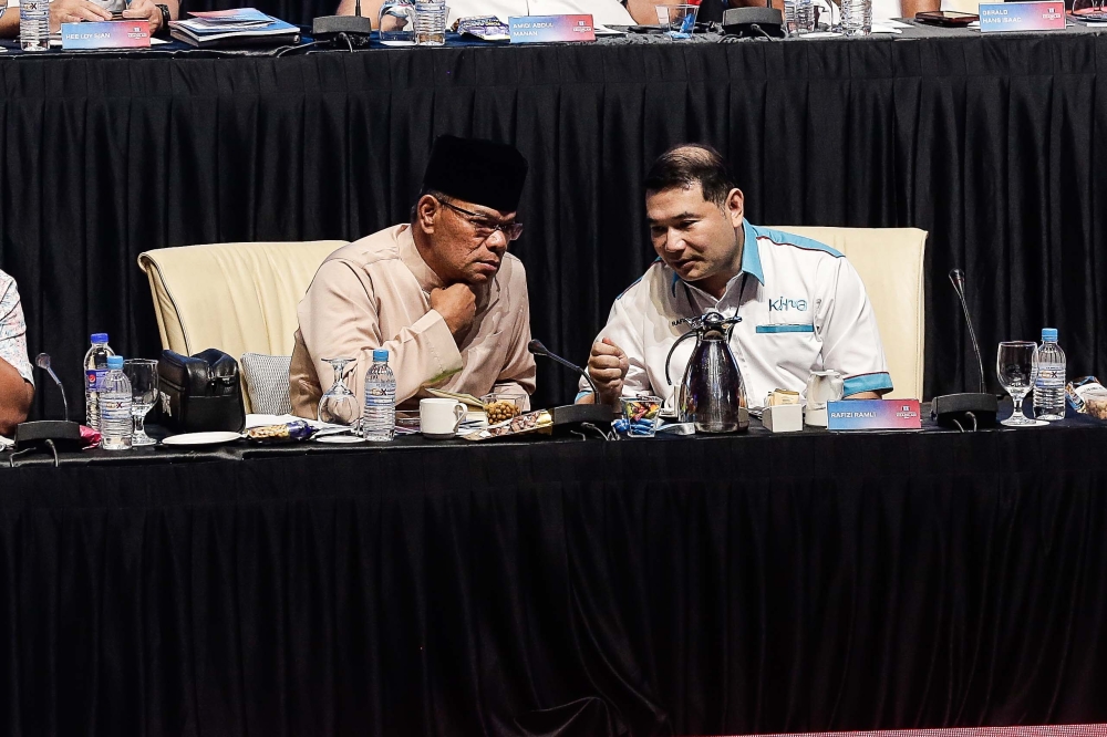 PKR secretary-general Datuk Seri Saifuddin Nasution Ismail (left) along with deputy president Datuk Seri Rafizi Ramli during the PKR Congress in 2023. — Picture by Sayuti Zainudin