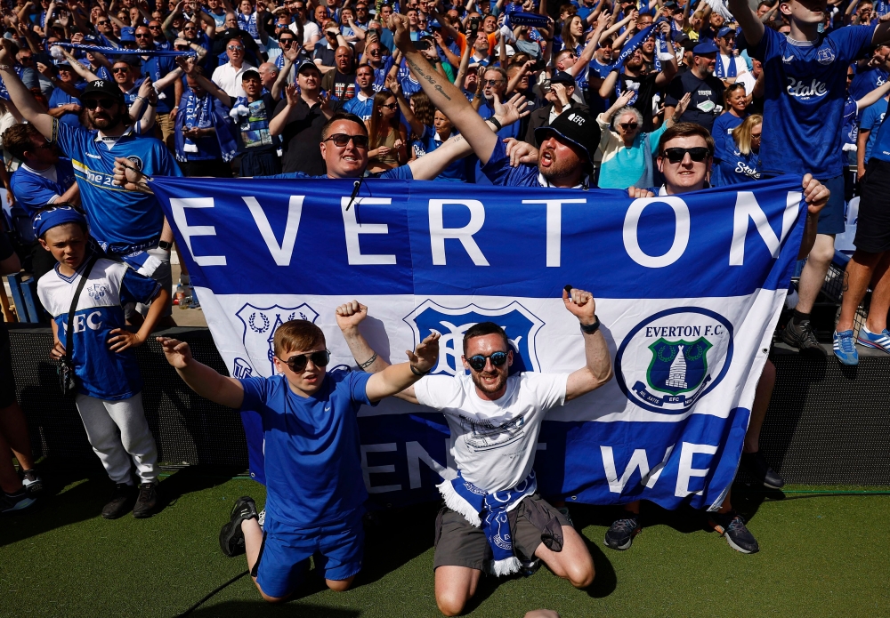 Everton fans react in the stands during a commemorative ceremony after the last match for the men's team at Goodison Park. — Reuters pic