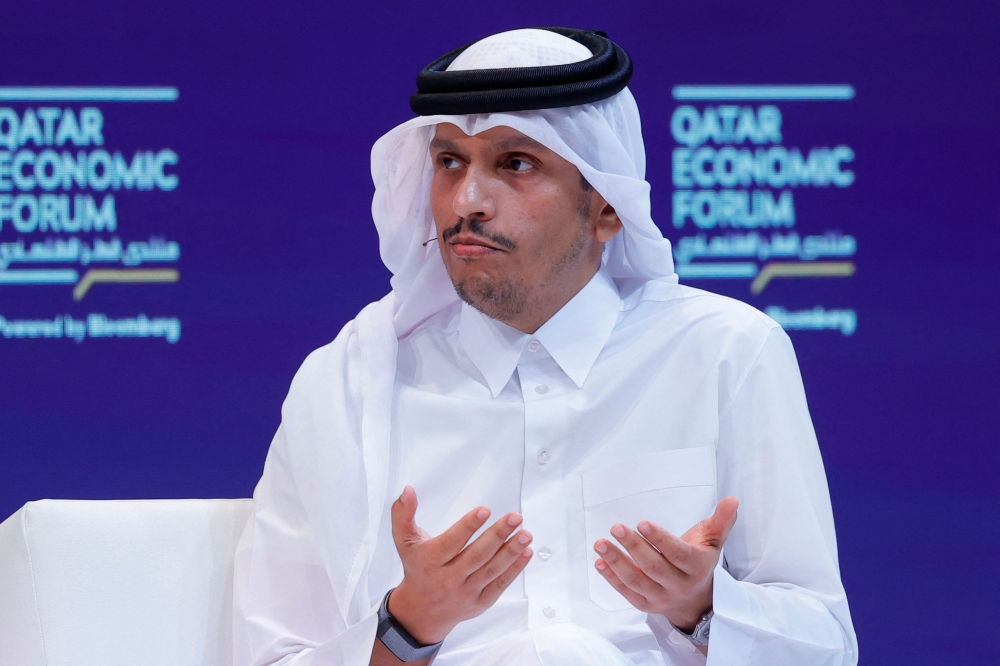  Qatari Prime Minister Mohammed bin Abdulrahman Al-Thani speaks at the Qatar Economic Forum in Doha May 20, 2025. — AFP pic