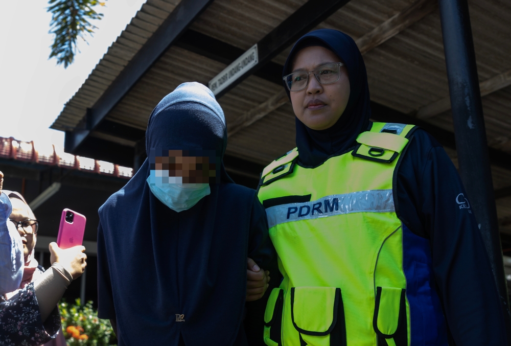 A woman suspected of involvement in the acid attack on a spa owner in Bachok was already remanded. — Bernama pic