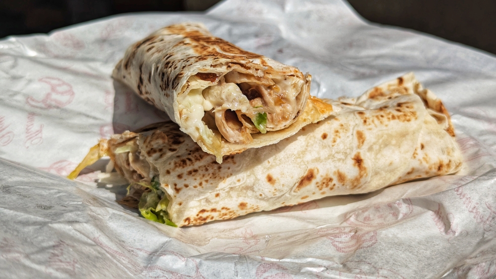 The chicken ‘shawarma’ is unexpectedly awesome and bursting with the flavour of ‘toum’, the garlicky, lemony sauce often used in ‘shawarma’. — Picture by Ethan Lau