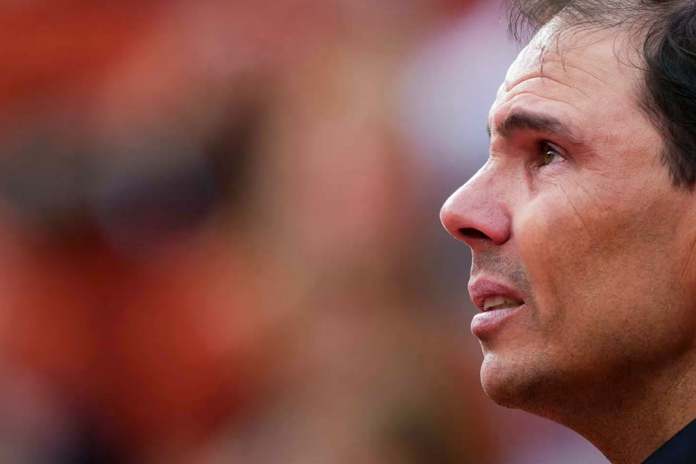Former Spanish player Rafael Nadal attends a ceremony honouring his career during the French Open tennis tournament on Court Philippe-Chatrier at the Roland-Garros Complex in Paris yesterday. — AFP pic