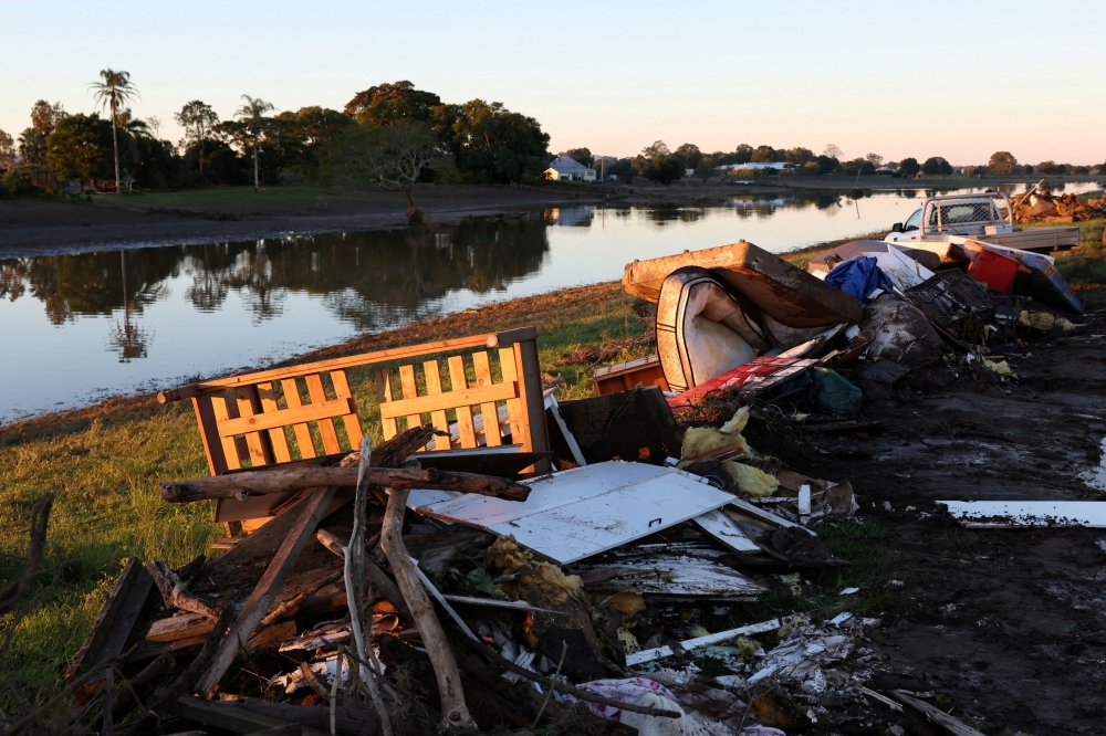 Debris lies on the bank of the Manning River after a flood, in Glenthorne, Australia, May 24, 2025. — Reuters pic
