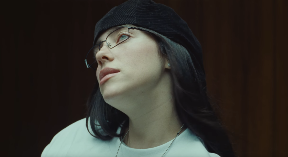 A screen grab shows singer Billie Eilish from her “Birds of a Feather” music video.