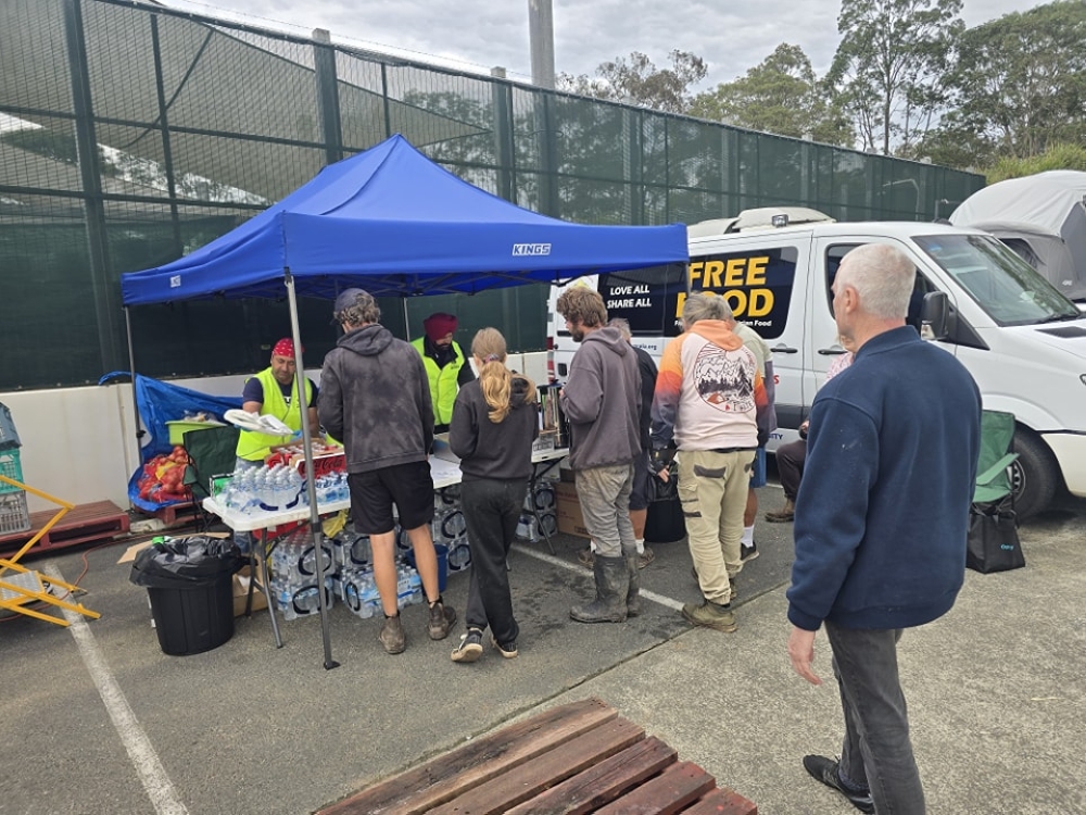 People queue for a free meal prepared by the Melbourne-based charity. — Picture via Facebook/Sikh Volunteers Australia