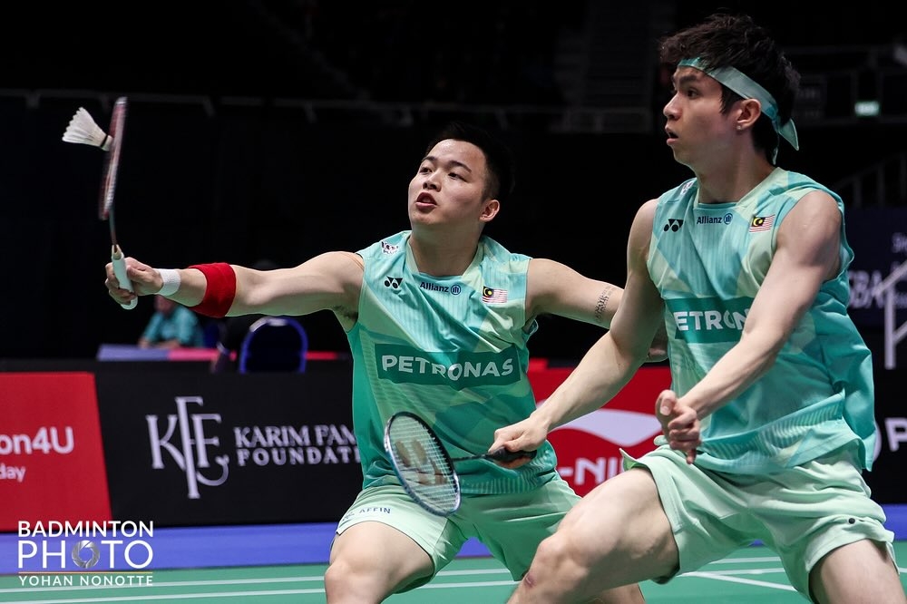 Malaysians Aaron Chia (left) and Soh Wooi Yik won 21-18, 24-26, 21-12 against Japanese doubles men’s pair Takuro Hoki-Yugo Kobayashi at the Singapore Open on May 29, 2025. — Picture from Facebook/Badminton Association of Malaysia - BAM