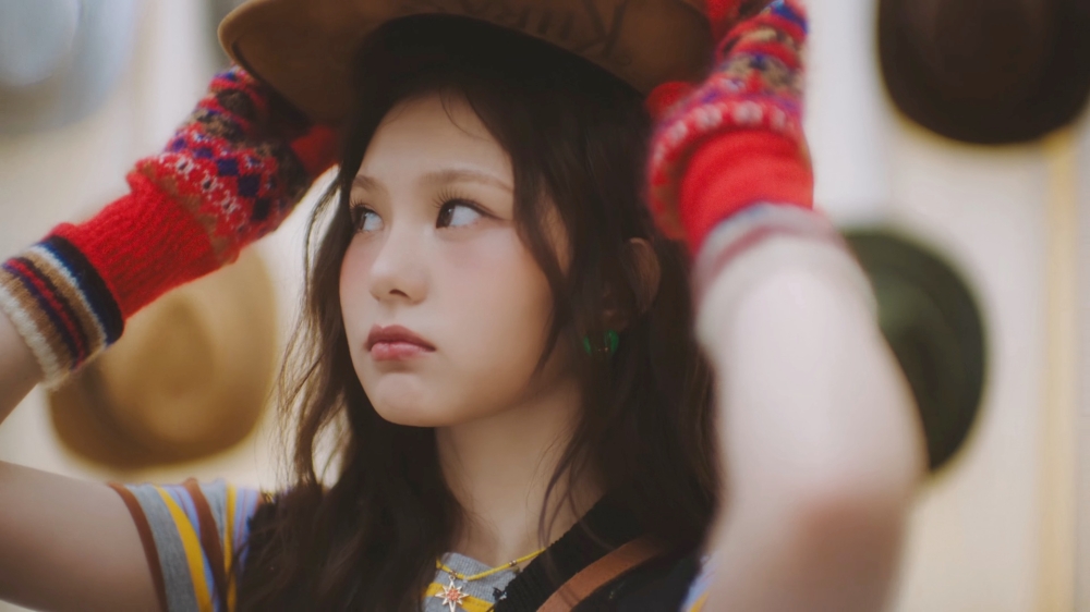 Lingling taking a cowboy hat in KIIRAS' 'Kill Ma Bo$$' video. — Screengrab from YouTube/KIIRAS