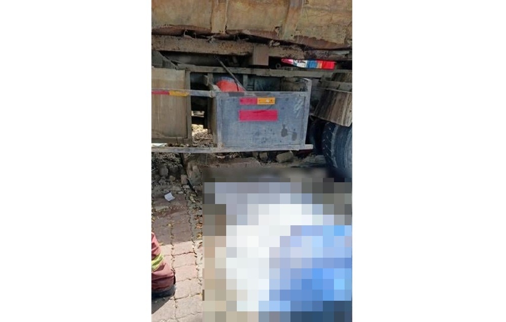 A 30-year-old man was killed when a lorry rammed into a motorcycle, a roadside stall, and the fence of a mosque in Bandar Baru Sungai Buloh yesterday afternoon. — Picture courtesy of the Fire and Rescue Department 