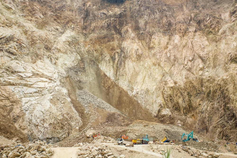 Rescuers use heavy equipment to search for landslide victims buried under rocks at the C excavation site in Cipanas, Dukupuntang, Cirebon Regency, West Java May 30, 2025.   — AFP pic