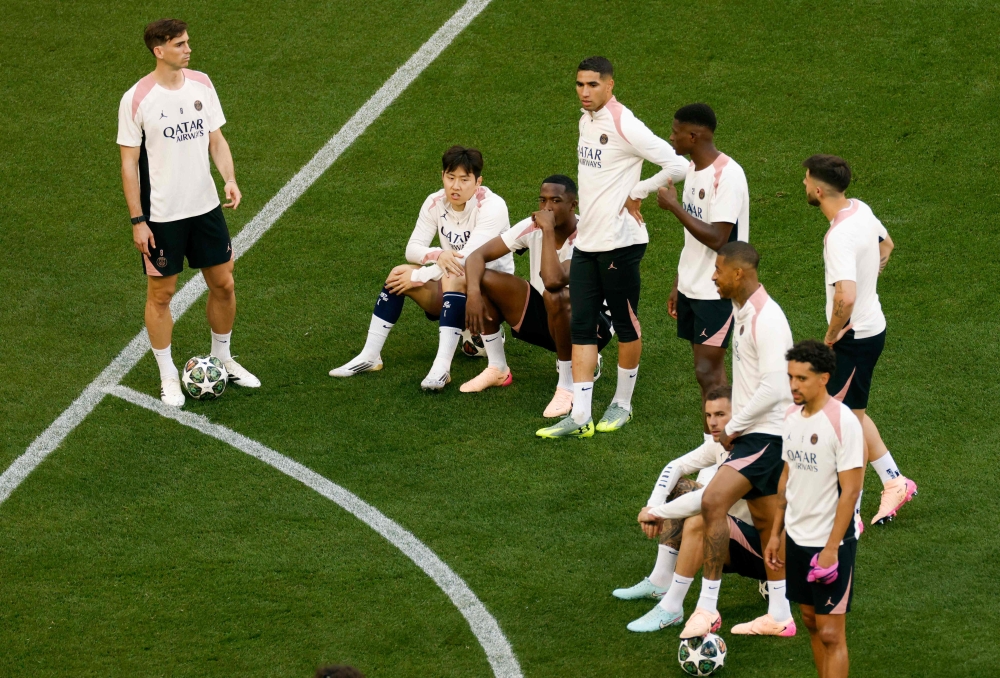 Paris Saint-Germain's players look on during the MD-1 training session on the eve of the Uefa Champions League final football match between Inter Milan and Paris Saint-Germain (PSG) in Munich May 30, 2025. — AFP pic