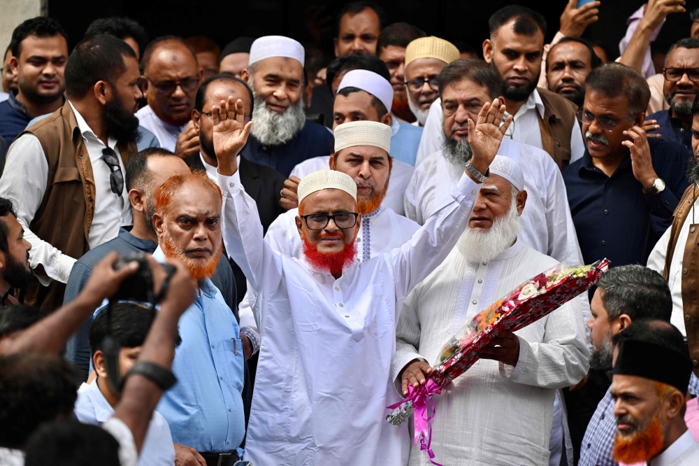 Bangladesh’s Jamaat-e-Islami leader ATM Azharul Islam gestures as he is released from prison in Dhaka May 28, 2025. — AFP pic
