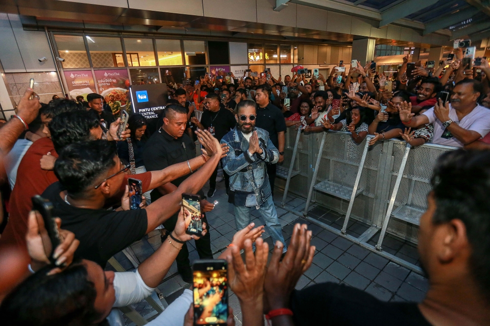Kamal Haasan waves at hundreds of Malaysian fans during a meet-and-greet session to promote his upcoming film ‘Thug Life at MyTown shopping centre yesterday. — Picture by Sayuti Zanudin