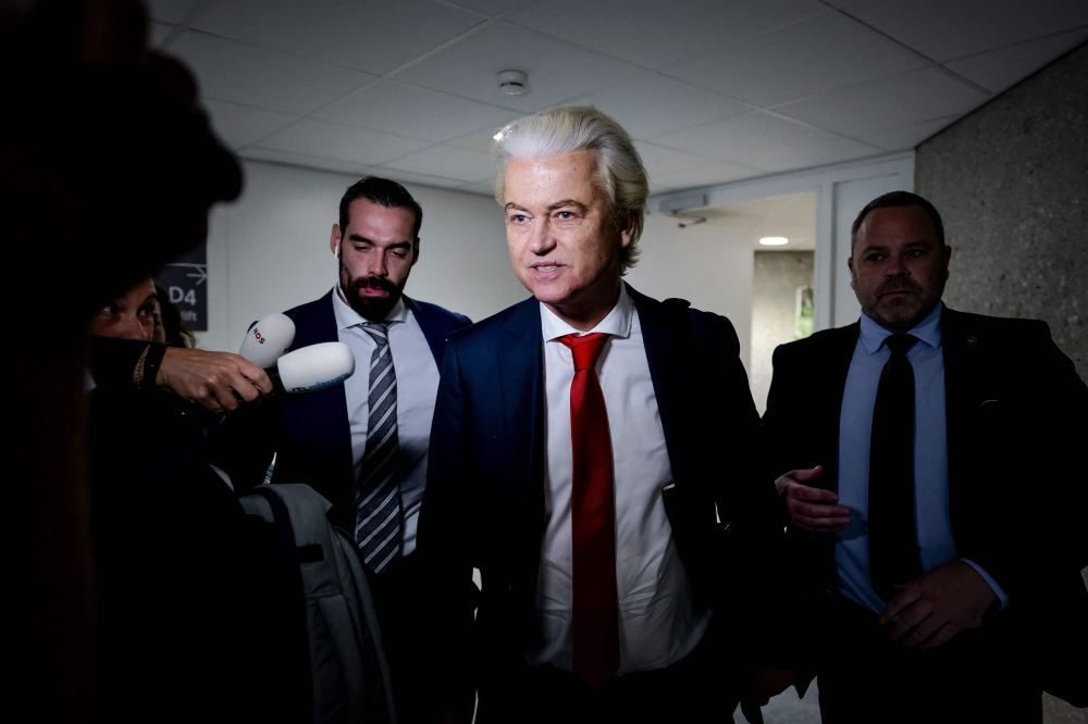 Dutch radical right party PVV leader Geert Wilders addresses the media as he arrives for the weekly coalition talks in the Lower House in The Hague, on June 3, 2025. — AFP pic 