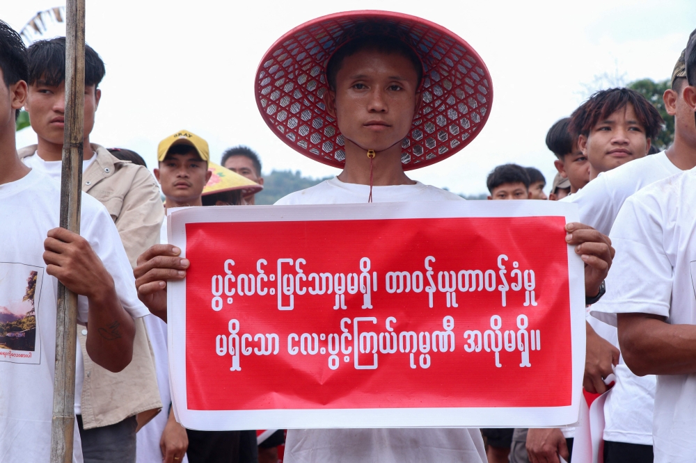 A Pradawng tribesman protests against a China-backed battery metal mine in Pekon town in eastern Shan, Myanmar on May 2, 2025. — AFP pic