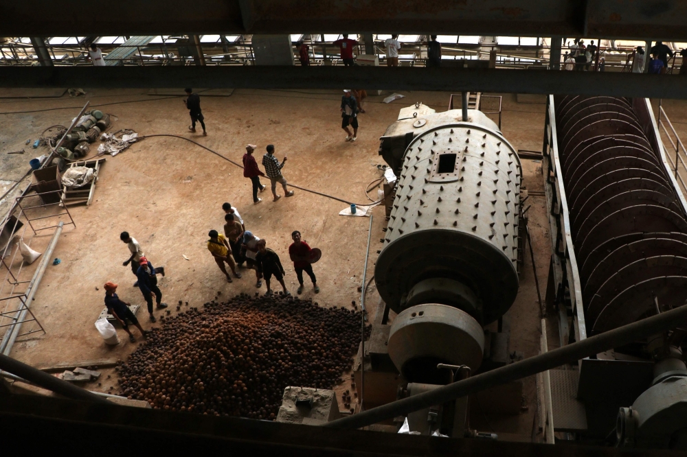 Pradawng tribesmen looking around inside a China-backed battery metal mine in Myanmar’s eastern Shan state on May 2, 2025. — AFP pic