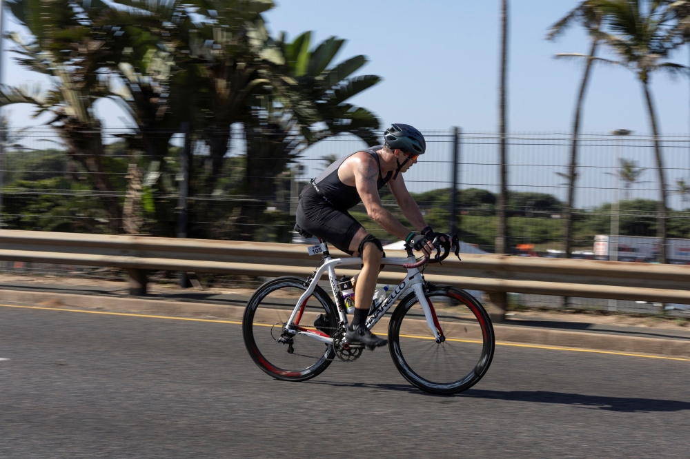 South African former Paralympian Oscar Pistorius competes in a triathlon event, 12 years after murdering his girlfriend Reeva Steenkamp, and a year after his release on parole, in the coastal city of Durban, South Africa, June 1, 2025. — Reuters pic