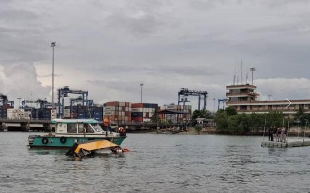 Three people, including a child, died after a boat capsized in the waters off Tanjung Harapan, Port Klang, yesterday. — Picture courtesy of Selangor Malaysian Maritime Enforcement Agency