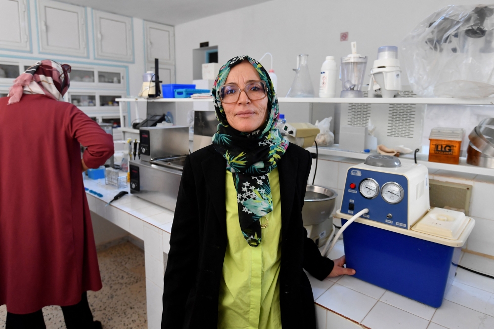 Amel Sboui, 45, a senior biochemist at the Institute of Arid Regions. — AFP pic