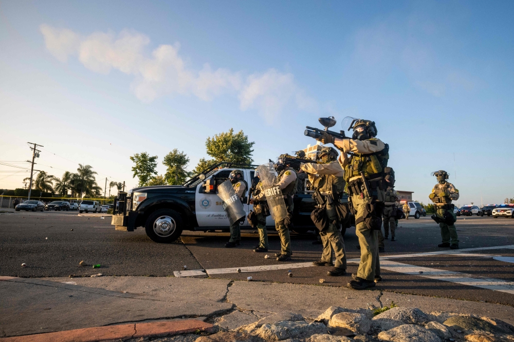 Trump deploys National Guard to Los Angeles as immigration raids spark ...