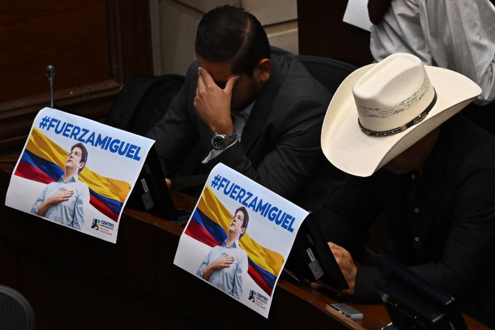 Posters with a photo of Colombian senator and presidential candidate Miguel Uribe that read ‘Strength, Miguel’ are seen at the Congress in Bogota on June 9, 2025. Doctors treating a Colombian presidential hopeful shot twice in the head by a would-be assassin warned he was not responding well to treatment Monday and that his condition remained grave. Right-wing Senator Miguel Uribe, 39, was shot by a 15-year-old alleged hitman at close range while campaigning in Bogota on Saturday. — AFP pic 