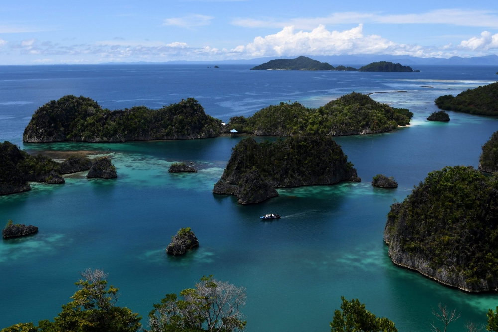 This file photo taken on August 21, 2017 shows islands around Raja Ampat in east Indonesia’s West Papua region. Indonesia revoked permits on June 10, 2025 for four of the five mining companies operating in the eastern archipelago of Raja Ampat after activists shared videos of islands damaged by nickel extraction. — AFP pic 