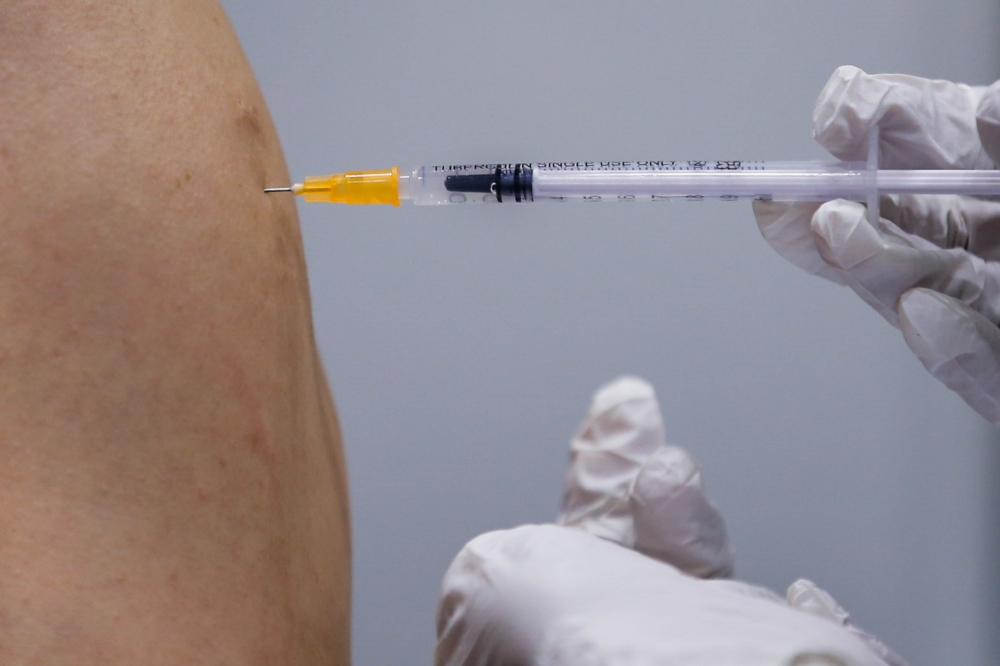 From September, helpers working in homes with unvaccinated children under seven in Singapore must show proof of measles immunity. ― Picture by Hari Anggara.