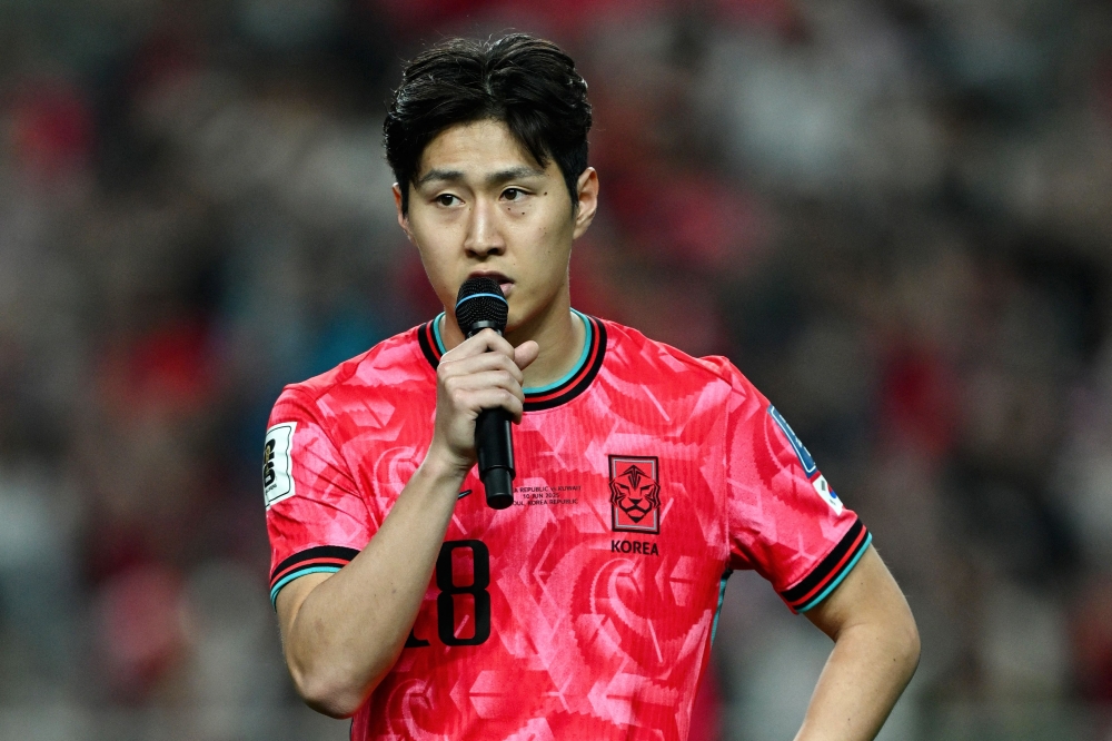 South Korea's Lee Kang-in addresses fans after the team's win against Kuwait at the end of their 2026 World Cup Asian qualifier Group B football match Seoul June 10, 2025. — AFP pic