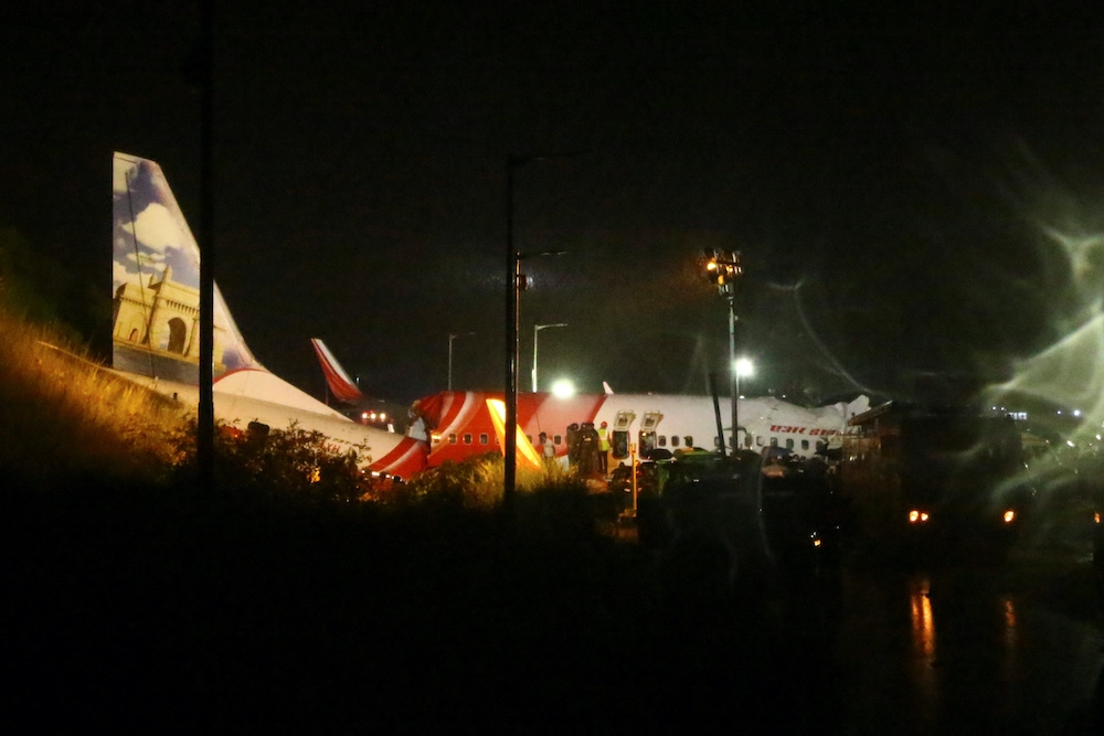 Rescue workers look for survivors after a passenger plane crashed when it overshot the runway at the Calicut International Airport in Karipur, in the southern state of Kerala August 7, 2020. — Reuters pic