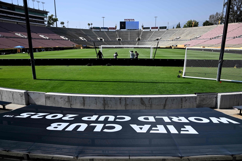 Workers install a goal at the Rose Bowl Stadium ahead of the Club World Cup 2025 match between Paris Saint-Germain (PSG) and Atletico Madrid in Pasadena, California, on June 12, 2025. — AFP pic