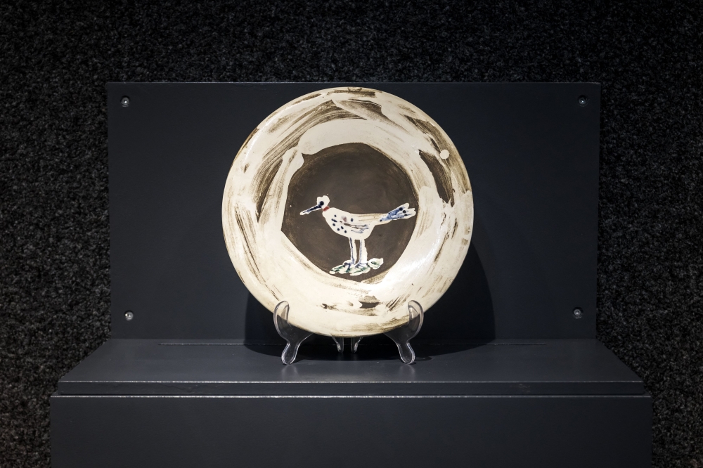 This photograph taken on June 5, 2025 shows the white earthenware plate ‘Bird’ (2.6.1963) by Spanish painter, sculptor, printmaker, ceramicist, and theatre designer Pablo Picasso, at the Piguet auction house in Geneva, prior to the auction of seven unique and never-before-seen ceramic works by the artist. — AFP pic