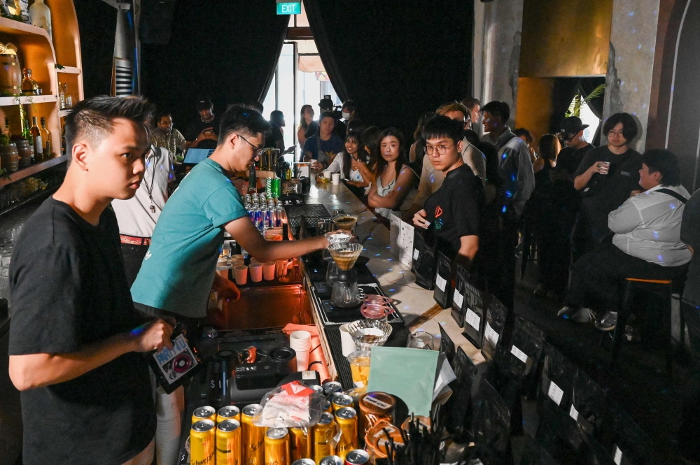 Swaying to dance music and TikTok-fuelled pop under a disco ball, young punters are packed shoulder to shoulder while sipping on coffee, their energy powered by pour-overs rather than pints. — AFP pic