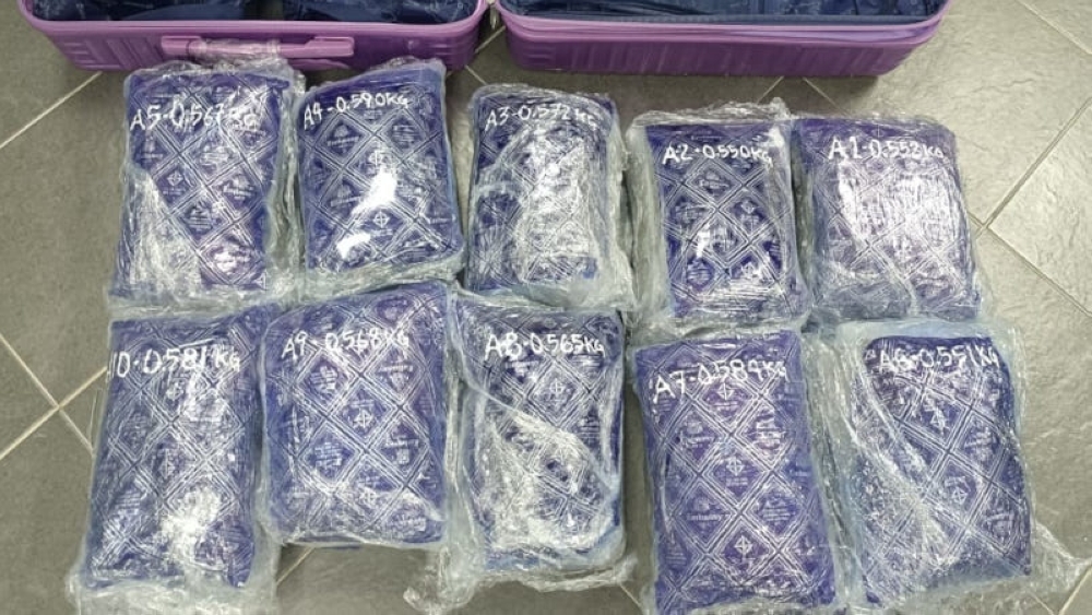 The luggage was found to contain 10 transparent plastic packets believed to hold cannabis buds. — Picture from social media 