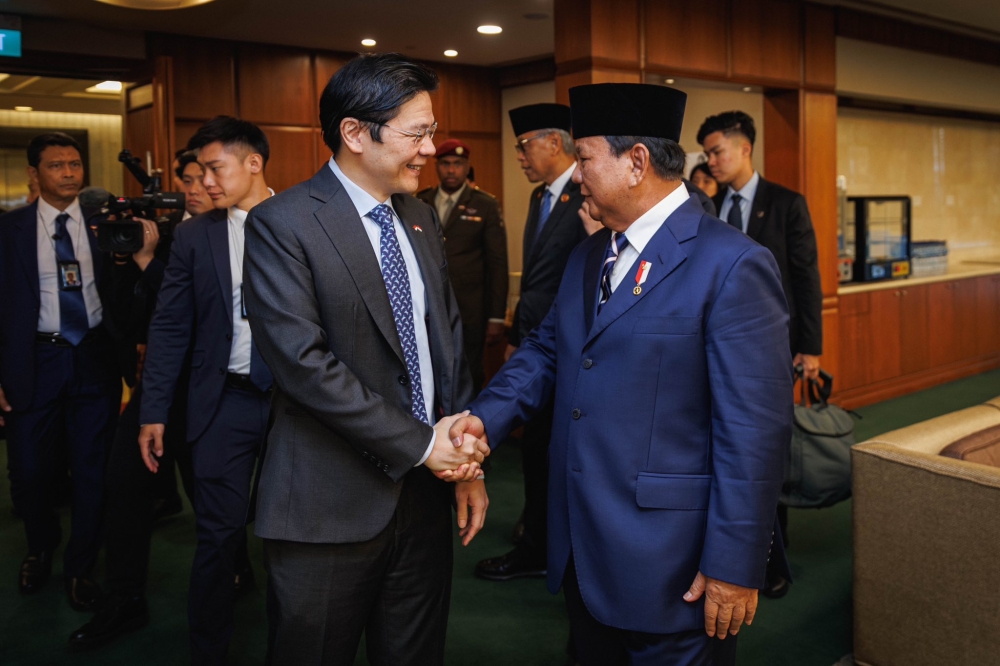 Singapore Prime Minister Lawrence Wong (left) and Indonesia President Prabowo Subianto during a Leaders’ Retreat this week. — Picture from Facebook/Lawrence Wong