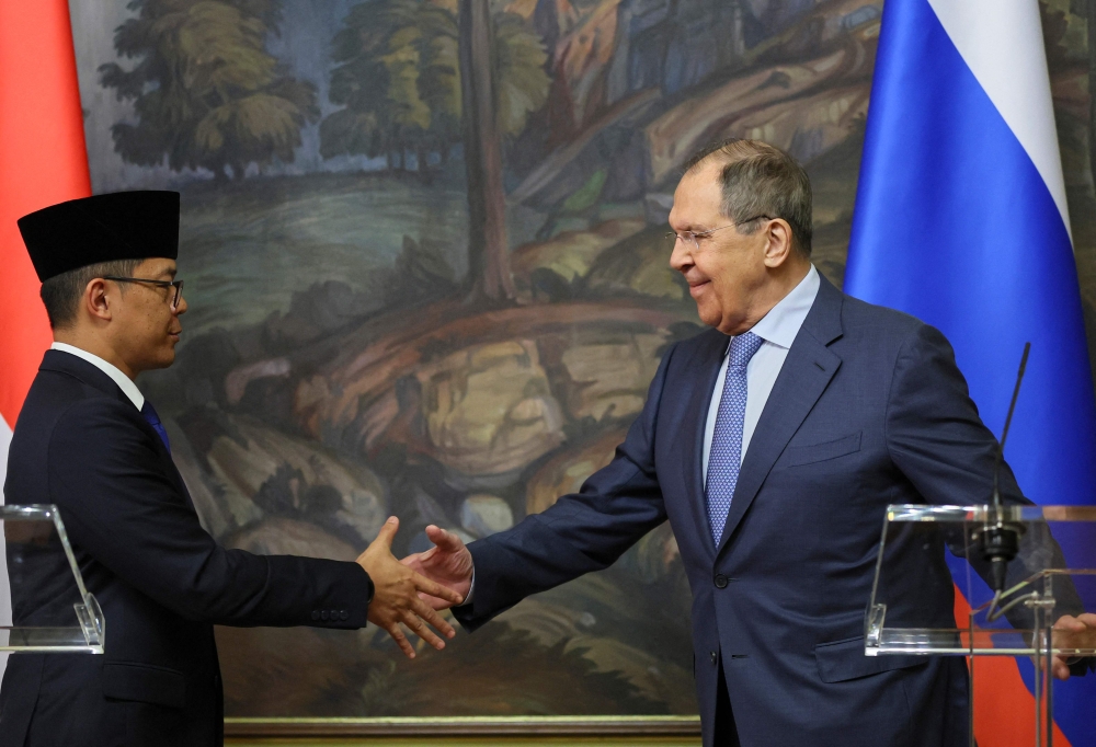 Russia’s Foreign Minister Sergei Lavrov shakes hands with Indonesia’s Foreign Minister Sugiono during a joint press conference following their meeting in Moscow on June 17, 2025. — AFP pic
