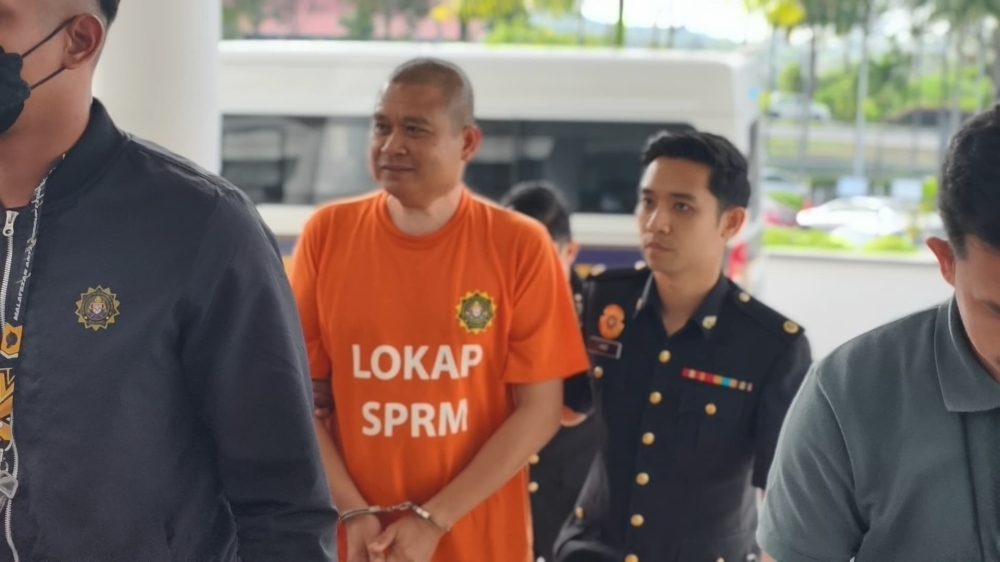 Former Senate deputy president Datuk Seri Mohamad Ali Mohamad pleaded not guilty to 20 bribery charges involving RM235,000 and three luxury cars over a Melaka land reclamation project. — Picture via Facebook/CheguBard
