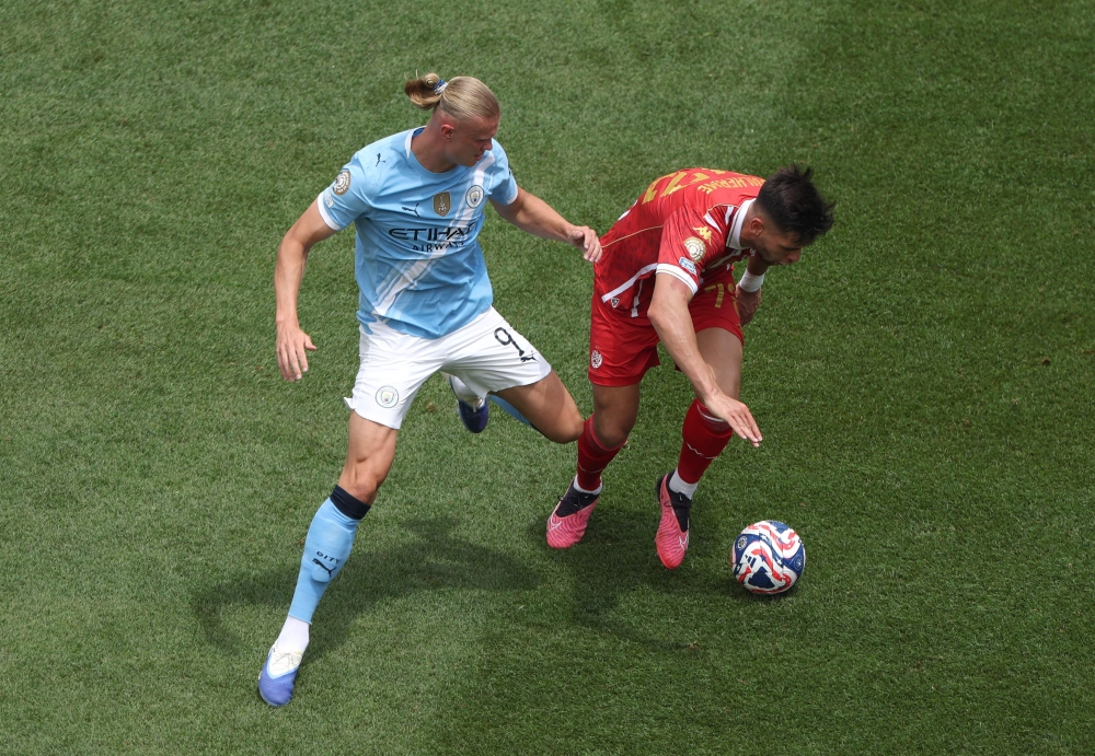 Guilherme Ferreira of Wydad AC is challenged by Erling Haaland of Manchester City during their Fifa Club World Cup 2025 Group G match in Philadelphia June 18, 2025. — AFP pic
