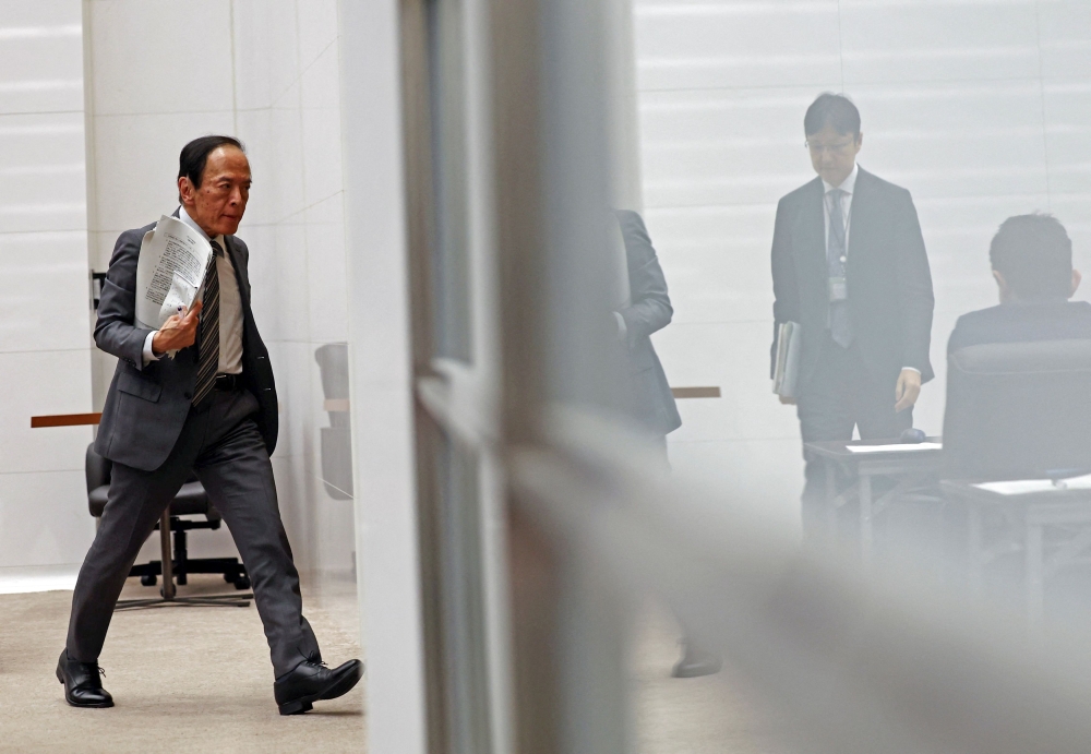 Bank of Japan Governor Kazuo Ueda leaves a press conference after a BOJ policy meeting in Tokyo June 17, 2025. — Reuters pic