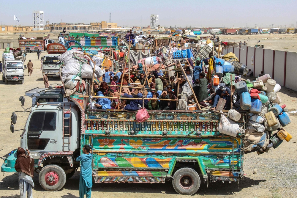 A truck filled with Afghan refugees and loaded with their belongings waits to depart for Afghanistan at a holding centre near the Pakistan-Afghanistan border in Chaman on April 11, 2025. Pakistan says it has expelled more than a million Afghans in the past two years, yet many have quickly attempted to return — preferring to take their chances dodging the law than struggle for existence in a homeland some had never even seen before. — AFP pic 