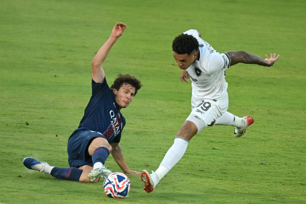 Paris Saint-Germain’s Joao Neves and Botafogo’s Igor Jesus fight for the ball during their Fifa Club World Cup 2025 Group B in Los Angeles June 19, 2025. — AFP pic