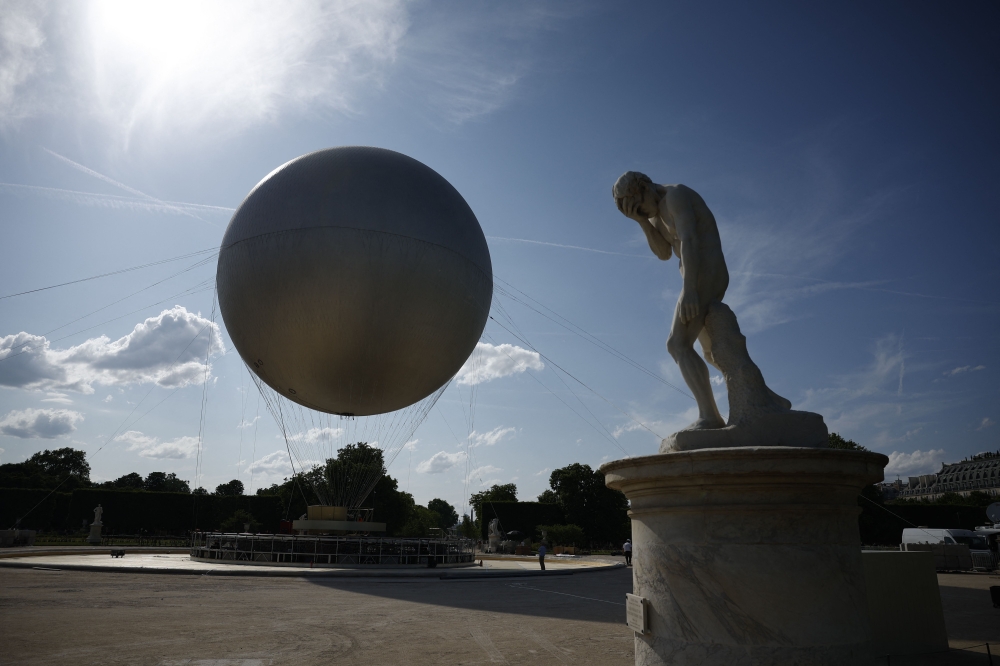 The Olympic cauldron is seen at the Tuileries Garden in Paris, on June 12, 2025. The cauldron will rise each evening from 21 June to 14 September until the 2028 Olympic Games in Los Angeles. — AFP pic