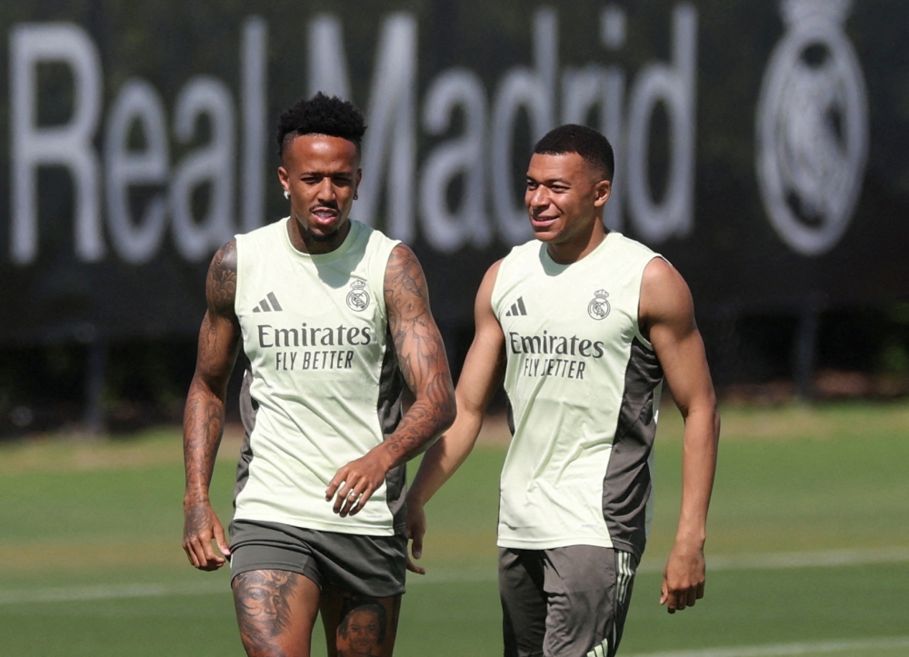 Real Madrid’s Eder Militao and Kylian Mbappe pictured during a training session at Gardens North County District Park in Palm Beach Gardens, Florida June 15, 2025, ahead of their Club World Cup campaign.