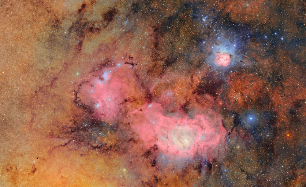 This undated handout image released by NSF-DOE on June 20, 2025 shows a combination of 678 separate images taken by NSF-DOE Vera C. Rubin Observatory in just over seven hours of observing time. Combining many images in this way clearly reveals otherwise faint or invisible details, such as the clouds of gas and dust that comprise the Trifid nebula (top right) and the Lagoon nebula, which are several thousand light-years away from Earth. — NSF-DOE Vera C. Rubin Observatory handout/AFP pic 